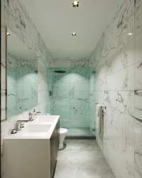 Large balcony with glass railing overlooking green areas and skyline in Panama Pacifico