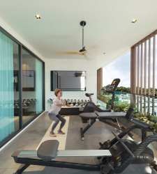 Open-concept living and dining with large windows and balcony in Panama Pacifico apartment