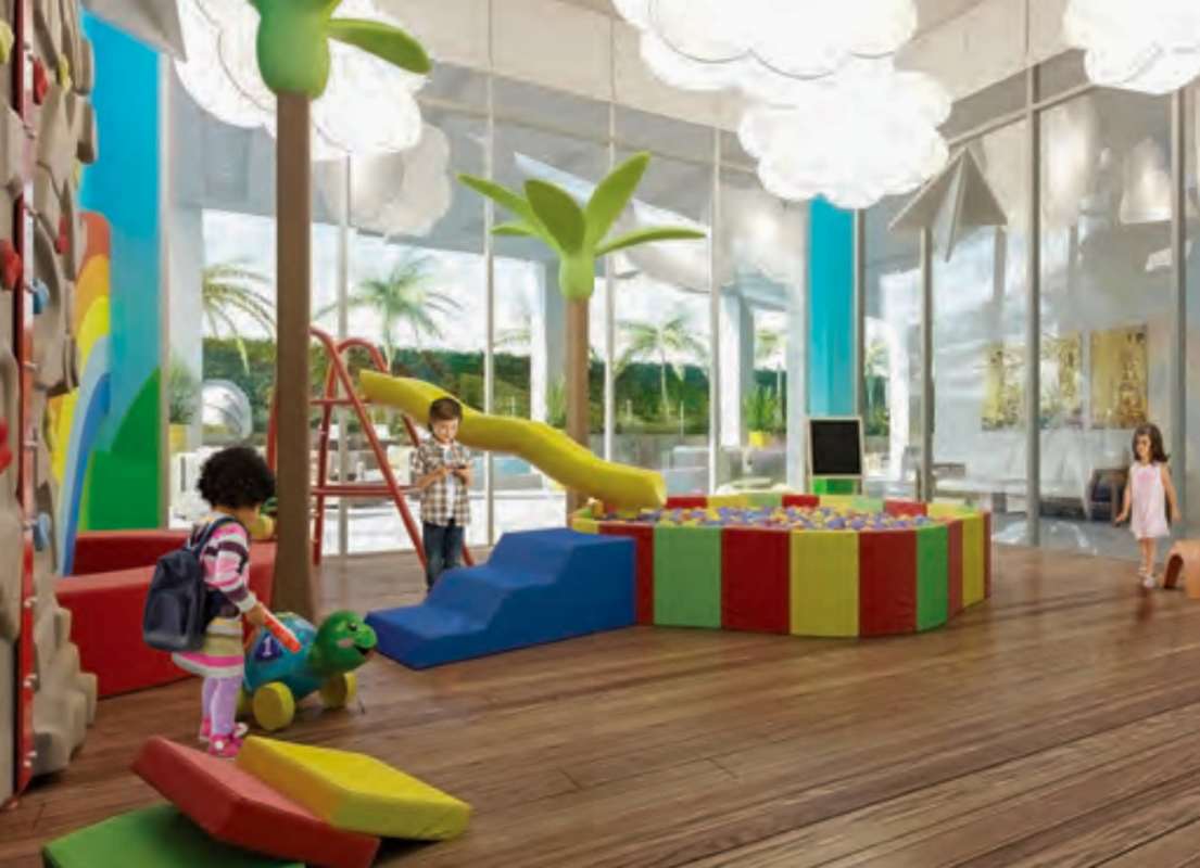 Colorful kids indoor playroom with slides, ball pit at PH El Cangrejo condo Panama