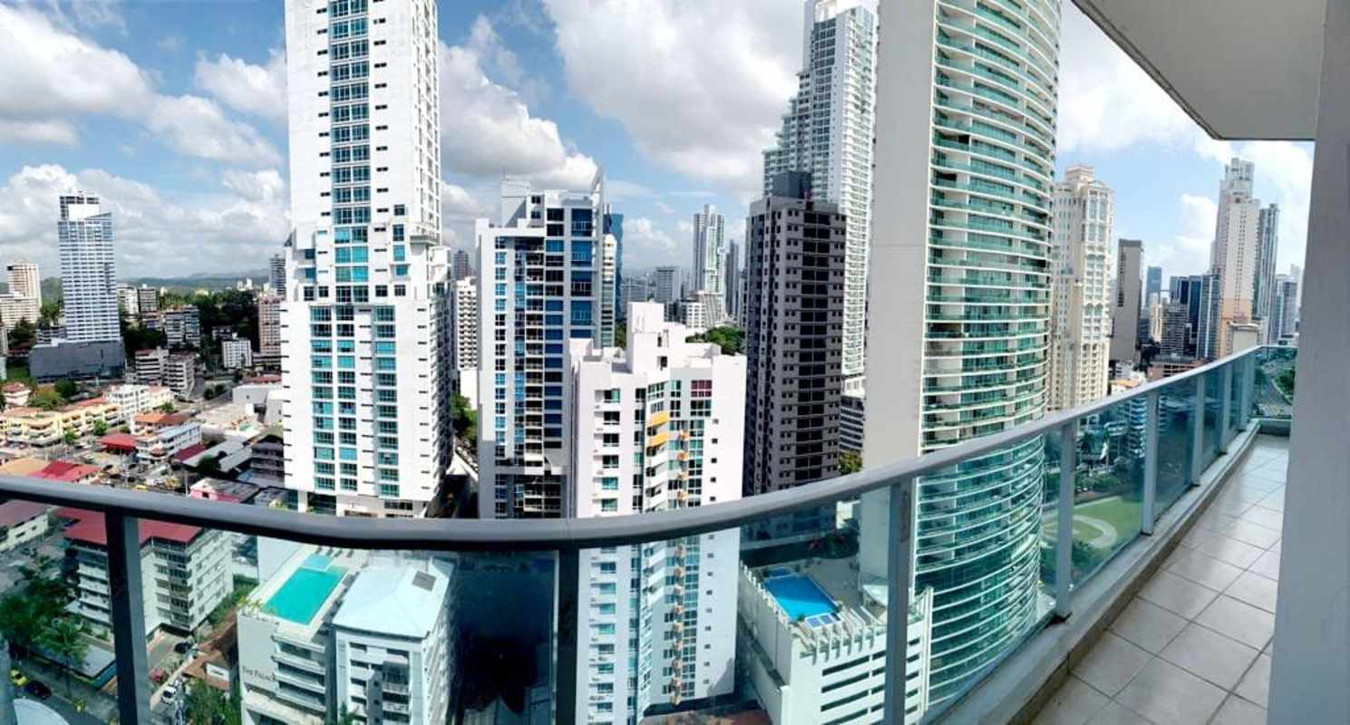 Bedroom with large windows, AC, skyline view at PH Vista Marina Bella Vista Panama City