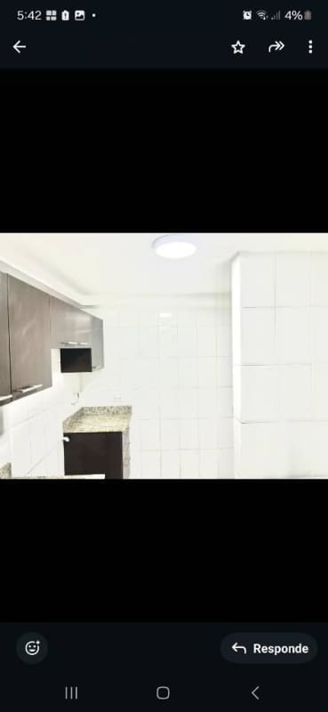 Bright kitchen with granite countertops and cabinetry in PH Edison Park Panama City