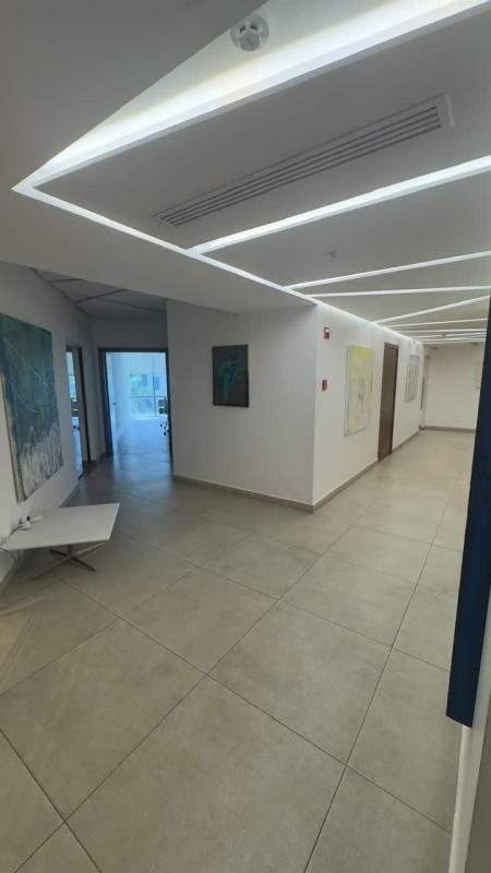 Glass enclosed meeting room with conference table and technology in PH Financial Park