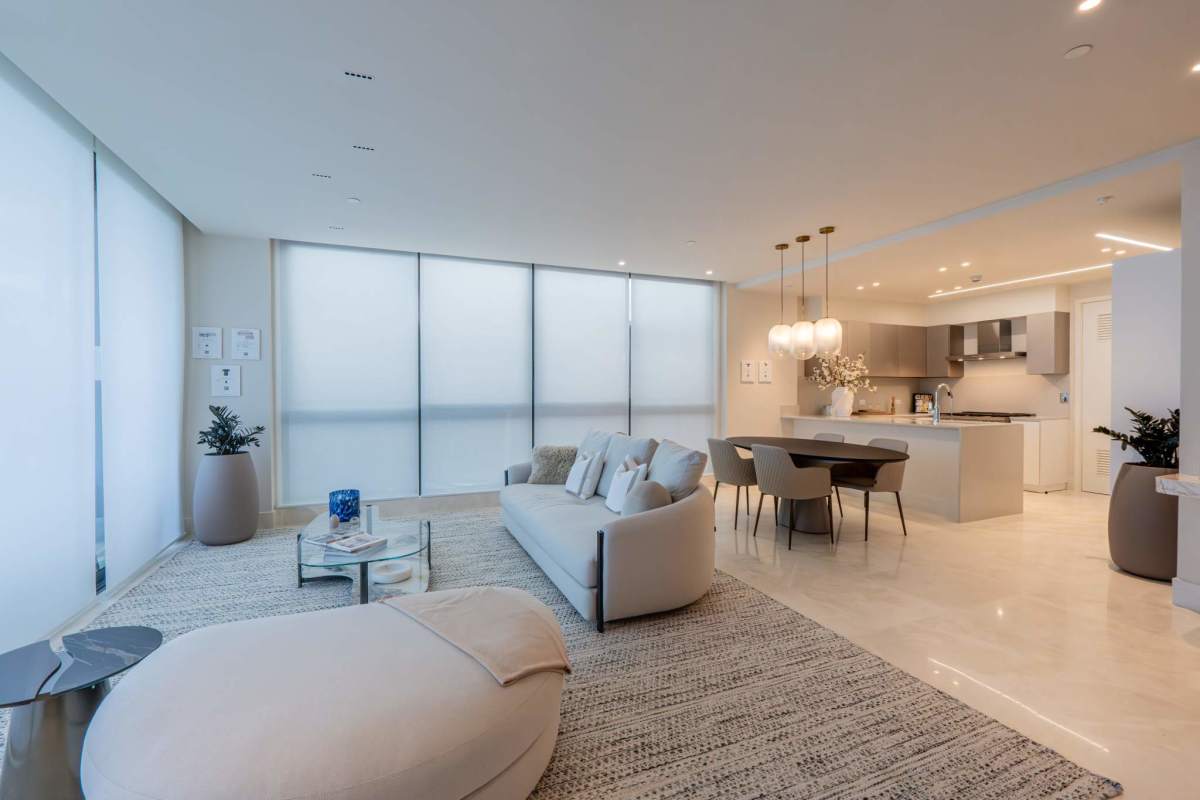 Open-plan designer kitchen with quartz countertops in luxury condo Ocean Reef Panama