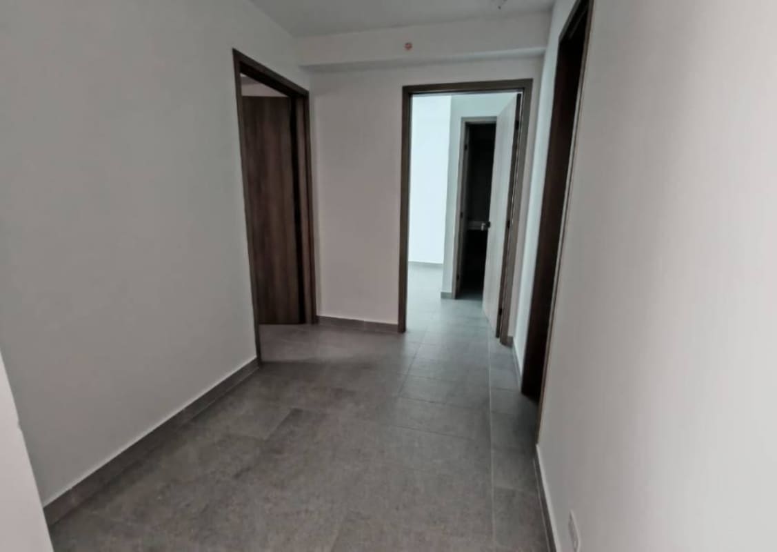 Minimalist hallway with multiple doors tile floor PH Park Square Panama