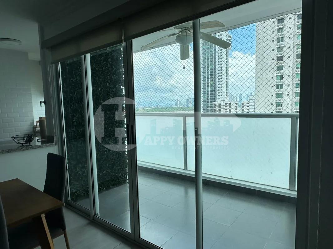 Spacious living-dining room with large windows and balcony access PH Moon Tower Coco del Mar