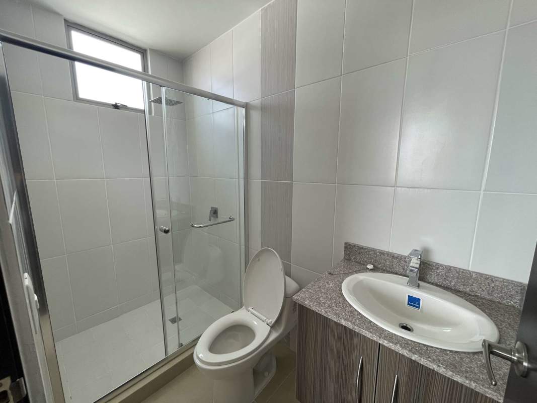 Contemporary bathroom granite countertop glass shower enclosure PH Altaterra Villa Lucre Panama