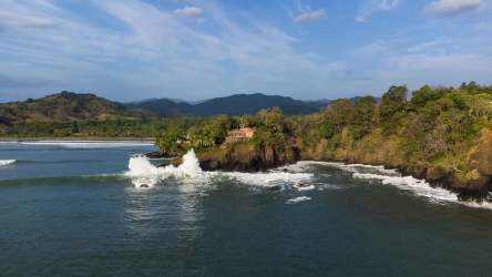 Kitchen with granite countertops, hardwood cabinets and ocean views in luxury Mariatos villa Panama