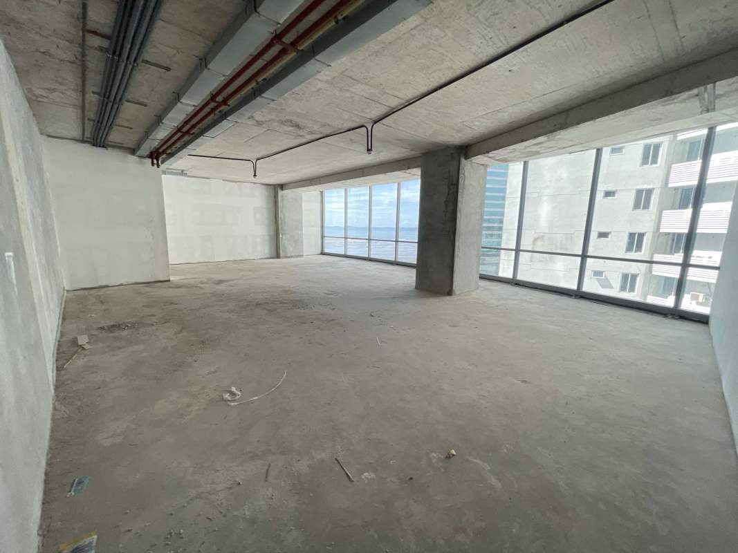Large unfinished commercial office space with glass facade views over ocean Costa del Este Panama