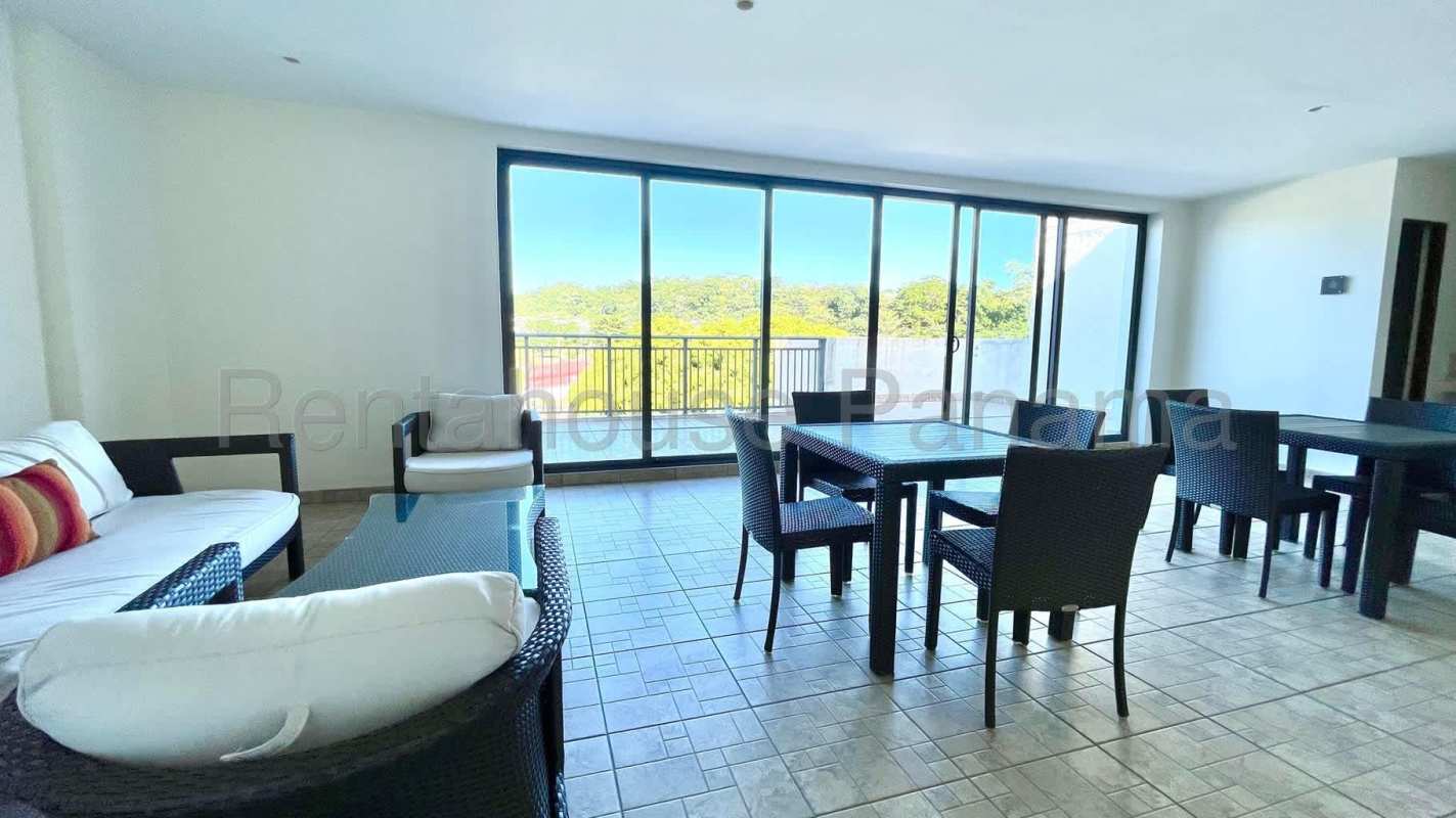 Modern kitchen with white line appliances in River Valley Panama Pacifico apartment