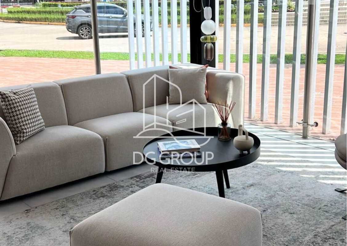 New bathroom with grey tiled wall, glass shower, and toilet in Generation Tower Panama