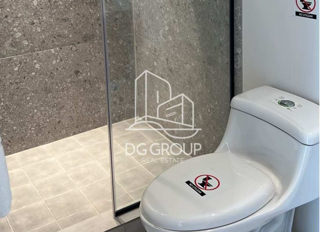 Contemporary bathroom with glass shower enclosure and vanity in Generation Tower Costa del Este Panama