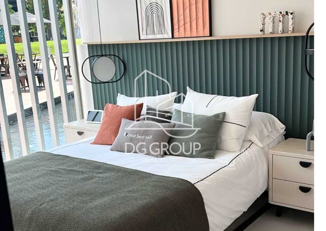 Bedroom corner with desk, teal wall, modern decor in Generation Tower Panama