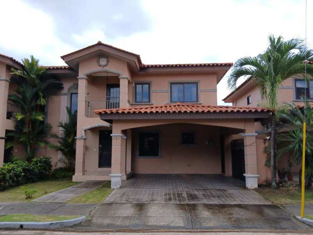 Spacious living-dining area with sliding glass door and garden view in Versalles Costa Sur Panama