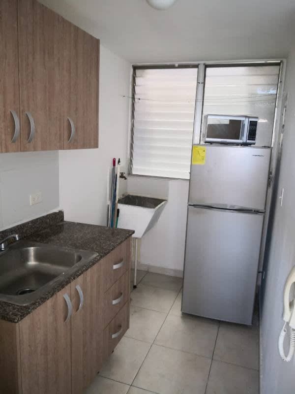 Outdoor swimming pool with garden area in PH Residencial Llano Bonito Panama City