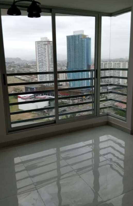 Rooftop outdoor swimming pool and modern gym amenities at PH City Gardens Panama City