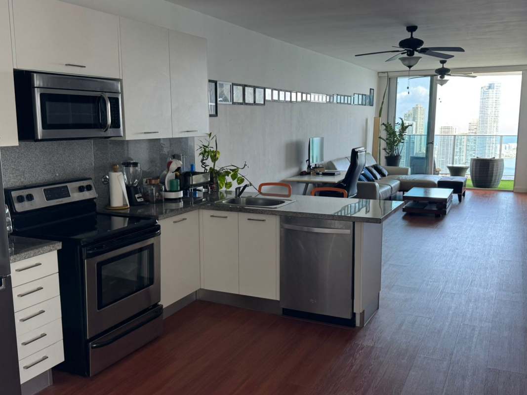 Spacious furnished living room with balcony and ocean views in PH Bicsa Financial Center Panama City