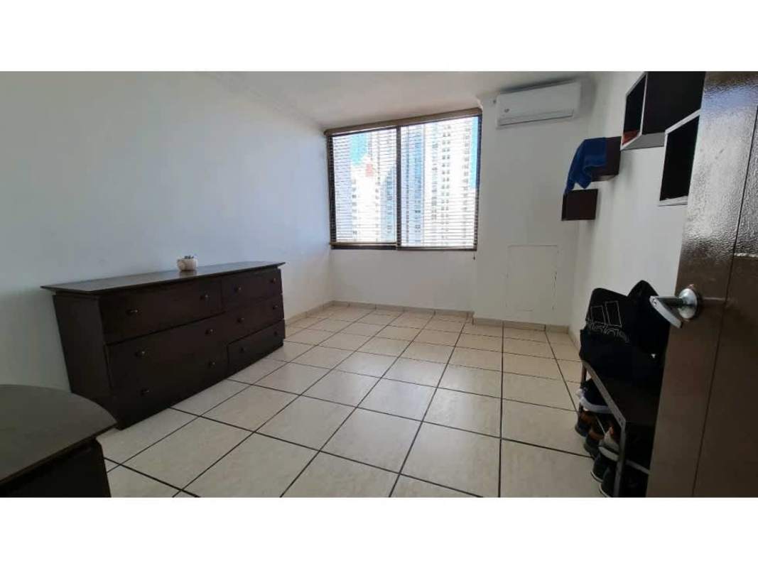 Bedroom with large window, natural light, city views in PH Torres Coco Mar San Francisco Panama