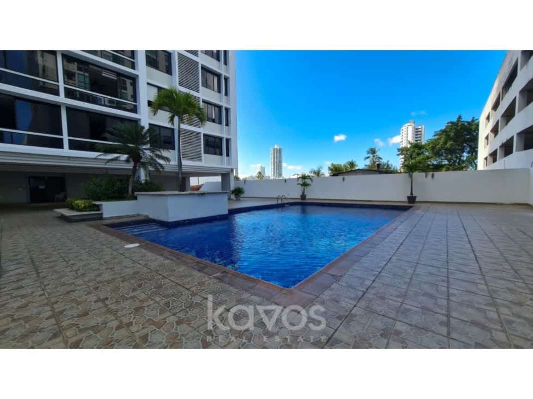 Outdoor pool with deck, modern high-rise background at PH Torres Coco Mar San Francisco Panama