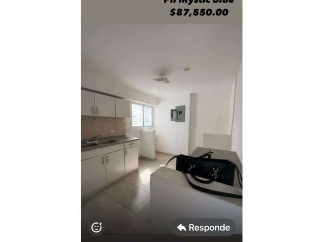 Functional bright kitchen with white cabinets and beige tiles in PH Mystic Blue Juan Díaz Panama