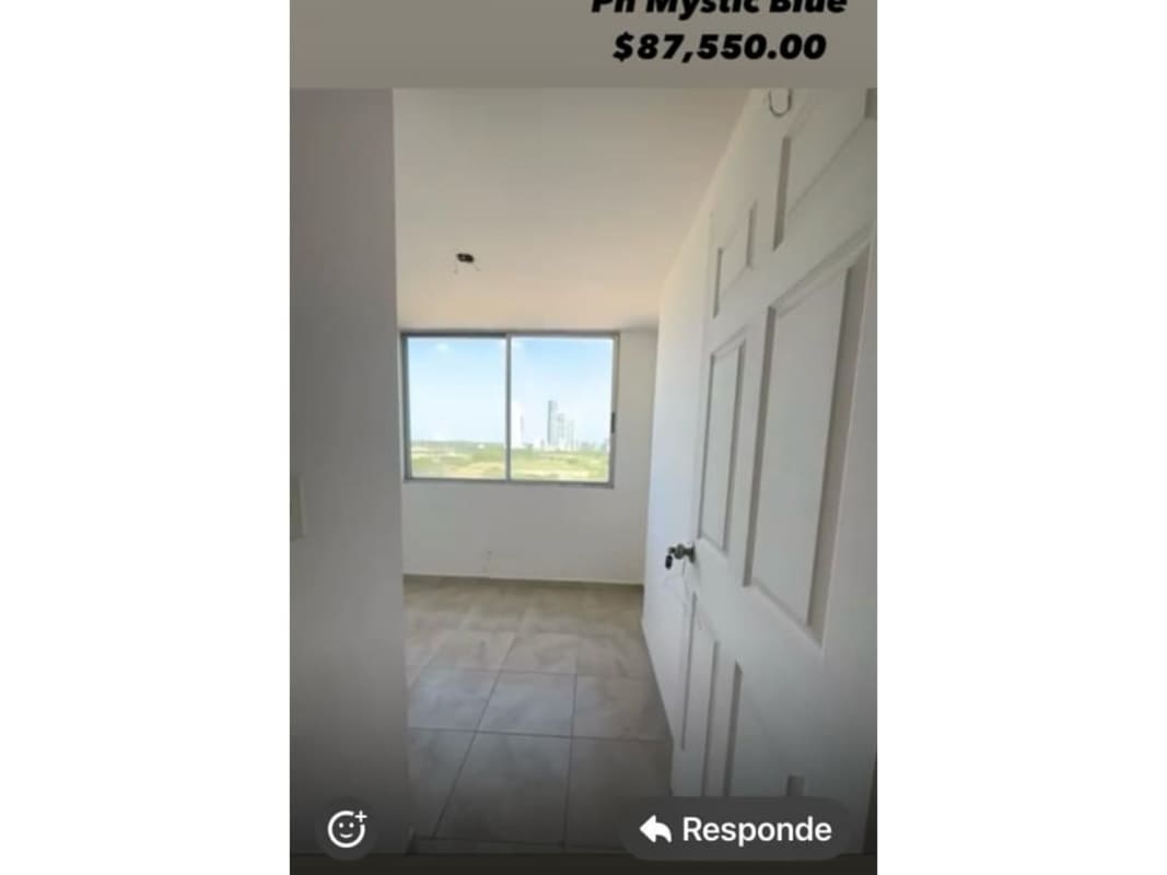 Bedroom with large window and tiled floors in PH Mystic Blue Juan Díaz Panama