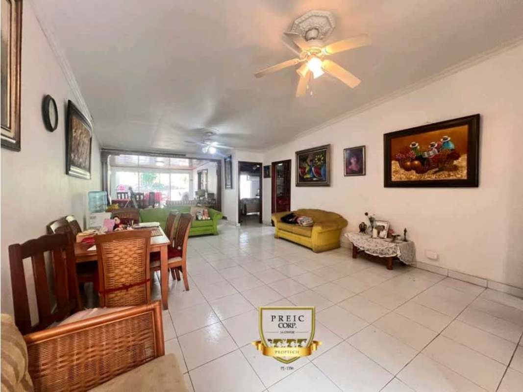 Spacious living/dining area with furniture, ceiling fan, bright windows Panama rental house