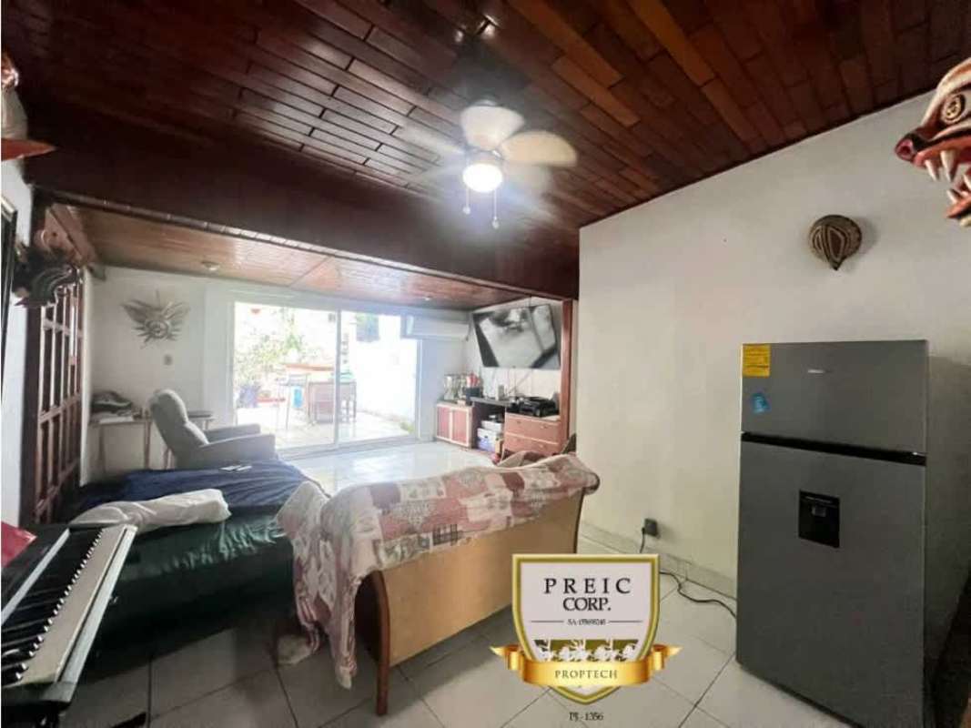 Cozy bedroom with wooden ceiling, tiled floor, louvered closets Panama rental house