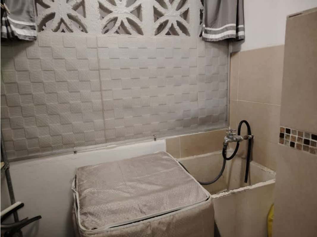 Exterior multi-story mixed-use building with blue and white facade PH Beverly Plaza Panama