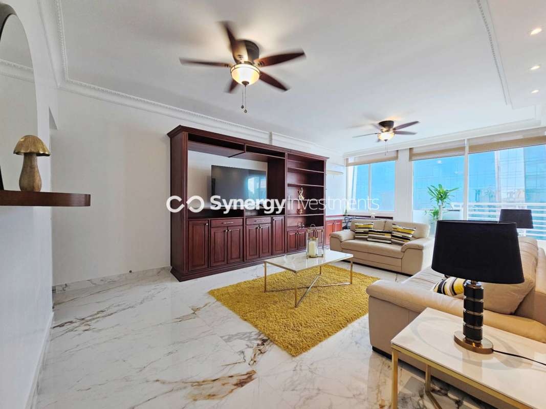 Contemporary bathroom with granite double sinks, mirrors, modern finishes in penthouse