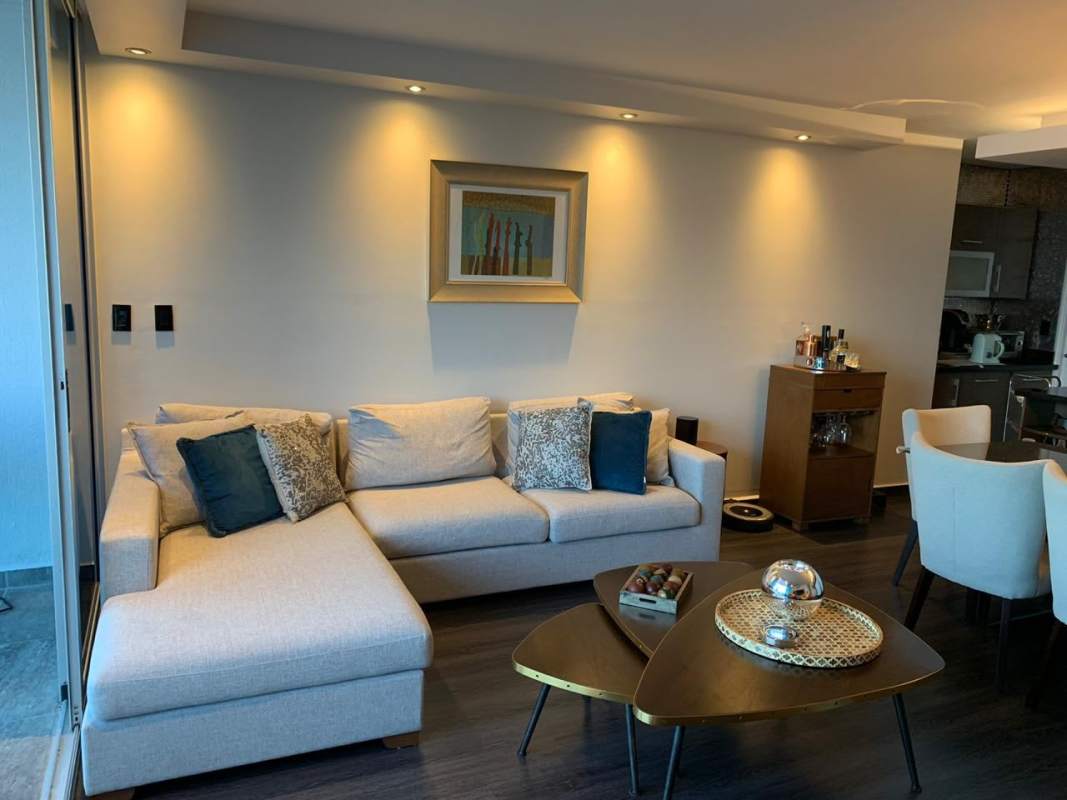 Master bedroom with ocean view windows and ensuite bathroom PH Coco del Mar Panama City