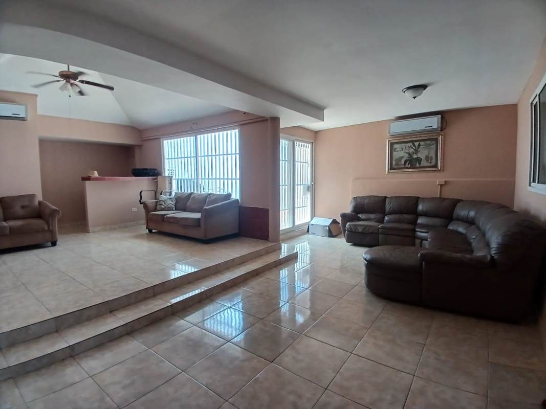 Large remodeled kitchen with gas stove, window with security bars in Brisas del Golf Panama