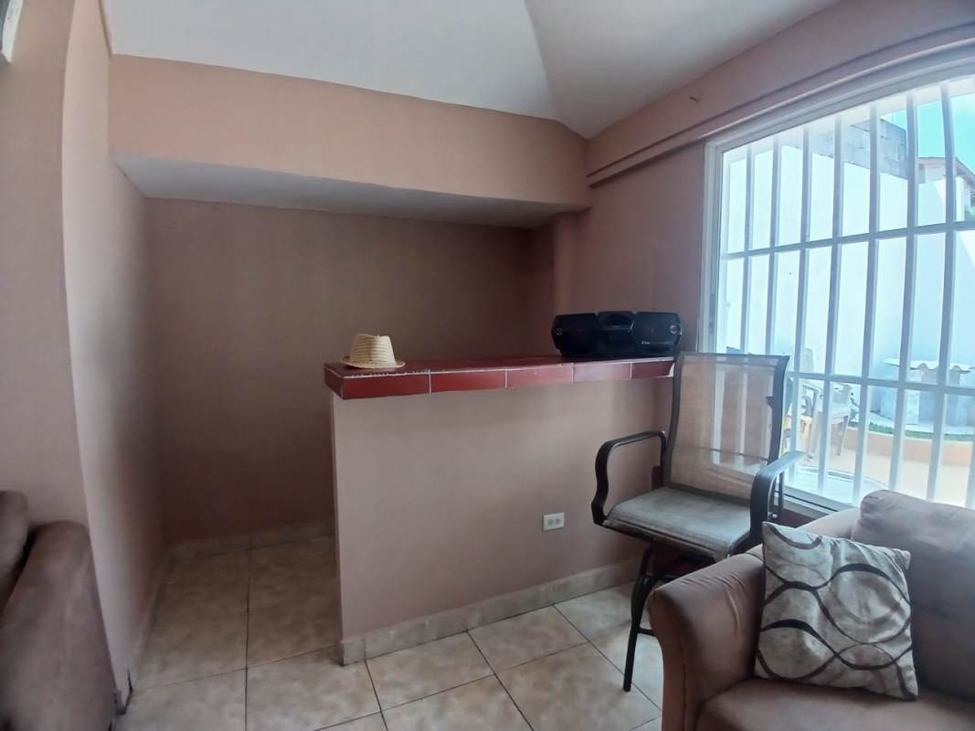 Private fenced backyard with tiled patio and garden area Brisas del Golf Panama