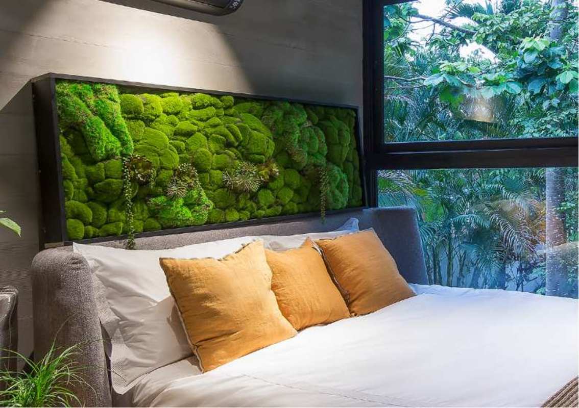 Rooftop terrace lounge with circular fire pit and ocean views at PH Urbana San Francisco Panama