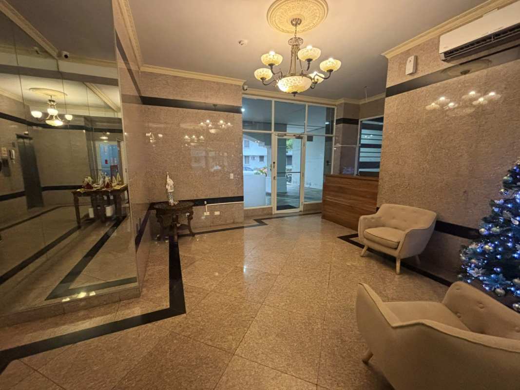 Compact kitchen with gas stove, cabinets and city view in PH Portobello El Cangrejo