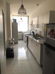 Second bedroom with tile floors, closet area, ceiling light in PH Vistas del Atlántico Colón Panama