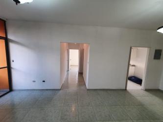 Long narrow kitchen white cabinets stainless sink PH Vistas del Atlántico Espinar Colón Panama