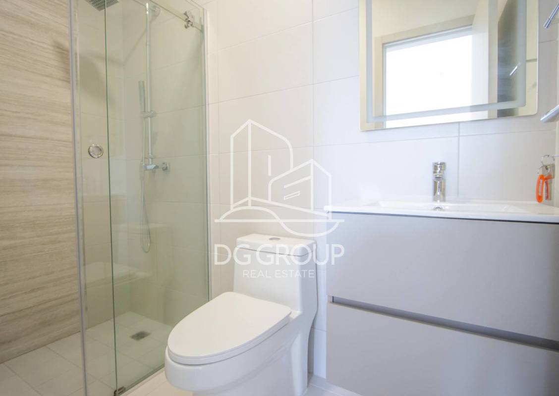 Modern living room with large windows panoramic city view Costa del Este PH Arcadia Panama