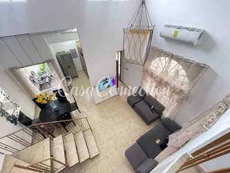 Living and dining area with sofa set AC and ceiling fan furnished duplex La Fontana David Panama