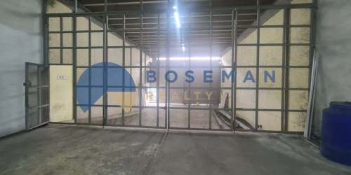 High ceiling warehouse with exposed beams and concrete floor huge storage space Zona Libre Colon