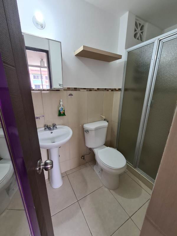 Secondary bedroom with closet space and window in Llano Bonito Panama condo