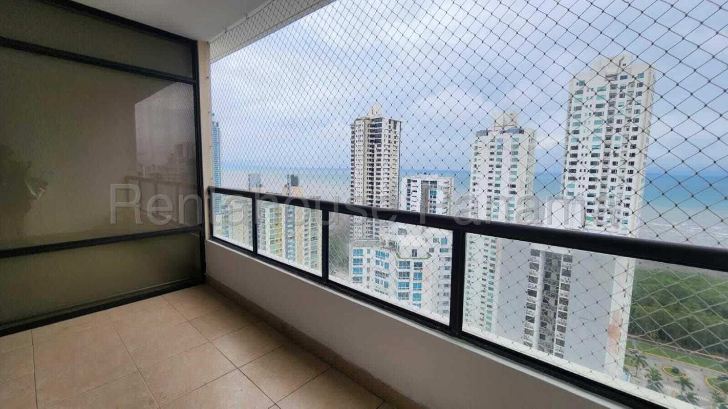 Spacious living room with floor-to-ceiling windows and balcony access at PH Costamare Panama