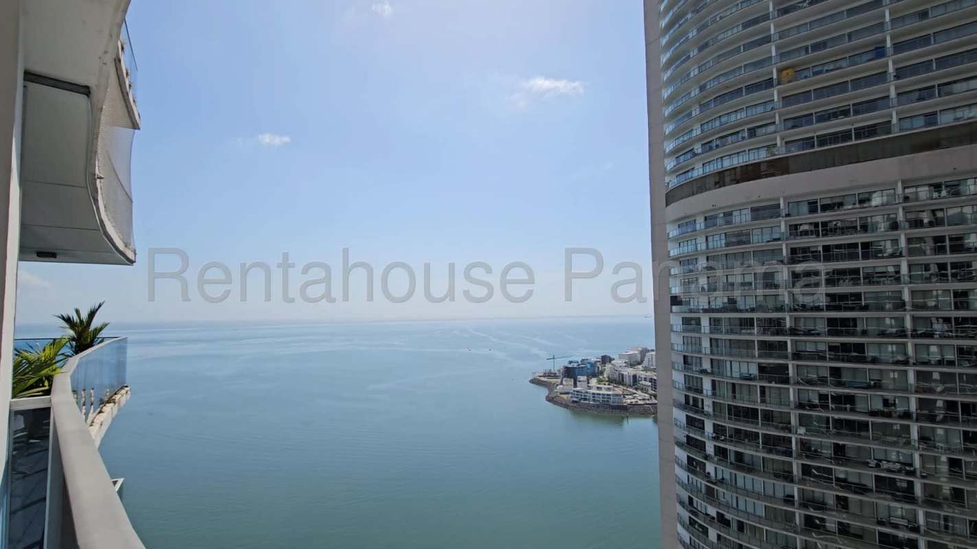 Modern granite countertop kitchen with stainless appliances in PH Ocean Club Punta Pacifica Panama