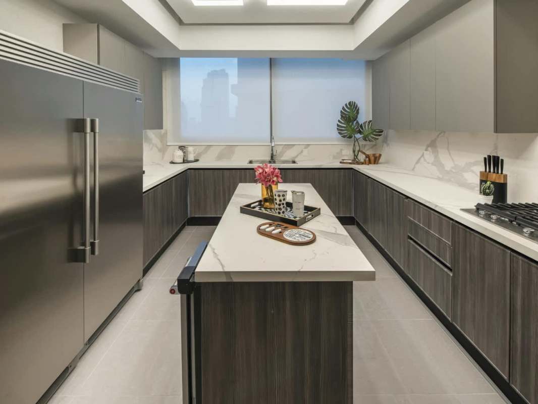 Contemporary kitchen with marble island, premium appliances, ocean views in PH Pacific Point Punta Paitilla Panama