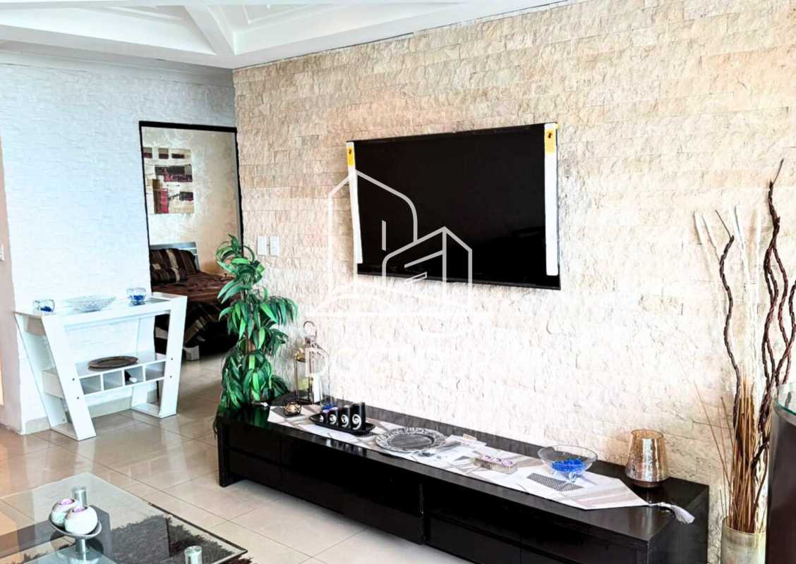 Ocean view living room with stone accent wall PH Pacific Hill Punta Paitilla Panama