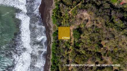 Rocky beachfront property with ocean waves and mature coastal vegetation Cambutal Panama