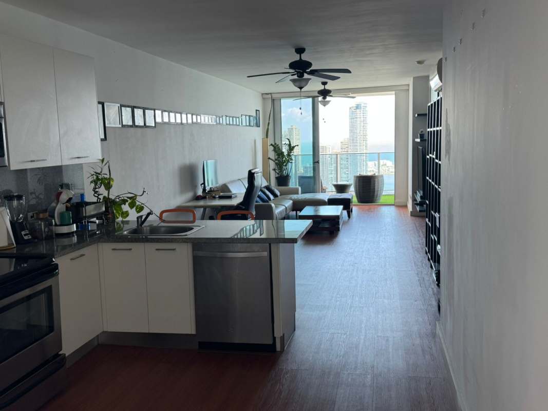 Furnished second bedroom with city skyline views at PH BICSA condo Panama City