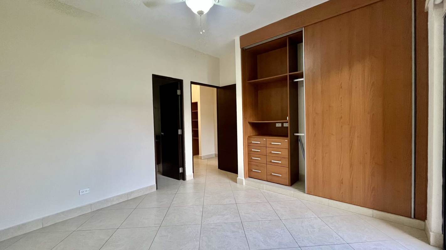 Bedroom with built-in closet, AC, balcony access at PH Embassy Club Clayton Panama
