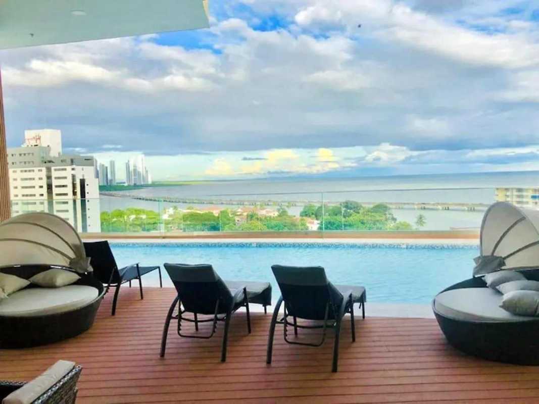 Bright living room floor-to-ceiling windows Panama ocean view PH Coco del Mar