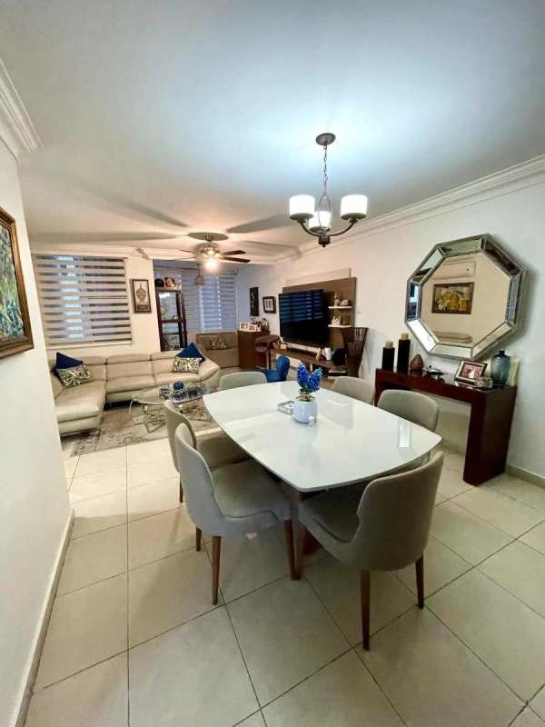 Open plan living dining area with balcony access at PH Bella Vista Park Panama City
