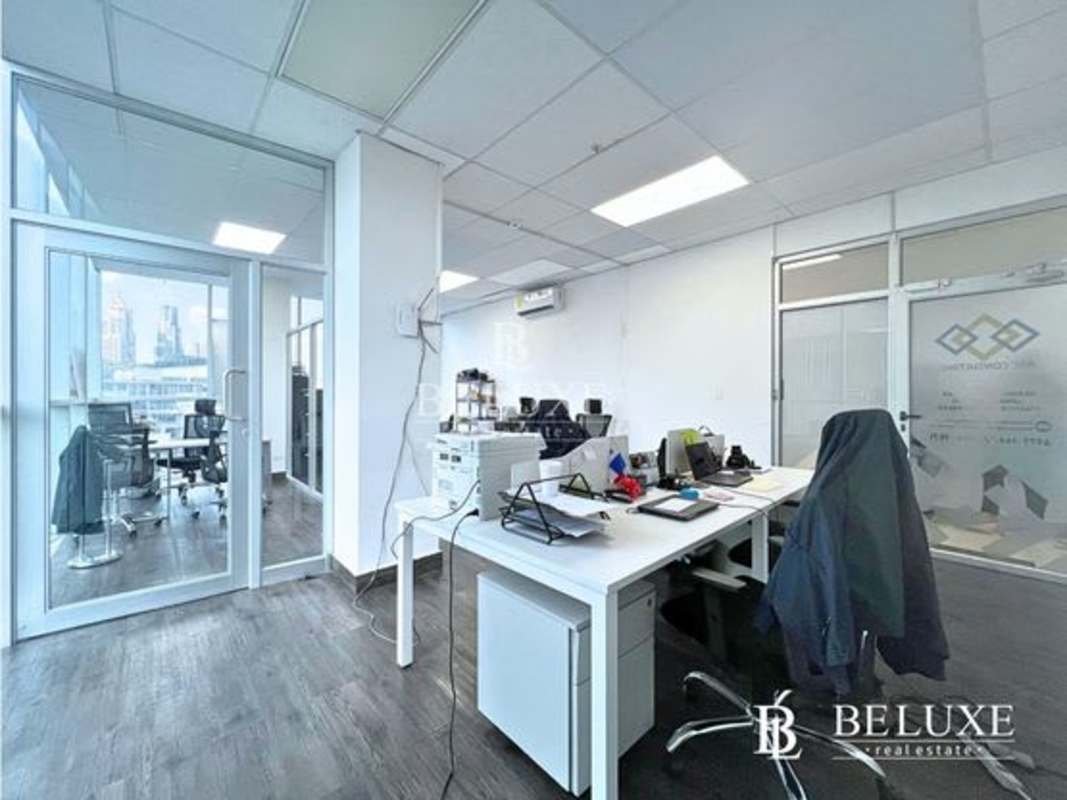 Spacious office with multiple desks city skyline view PH USB Tower El Carmen Panama