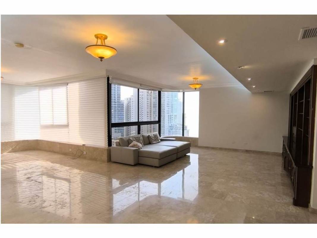 Spacious luxury living room marble floor built-in wood cabinets panoramic windows PH Mirage Punta Paitilla Panama